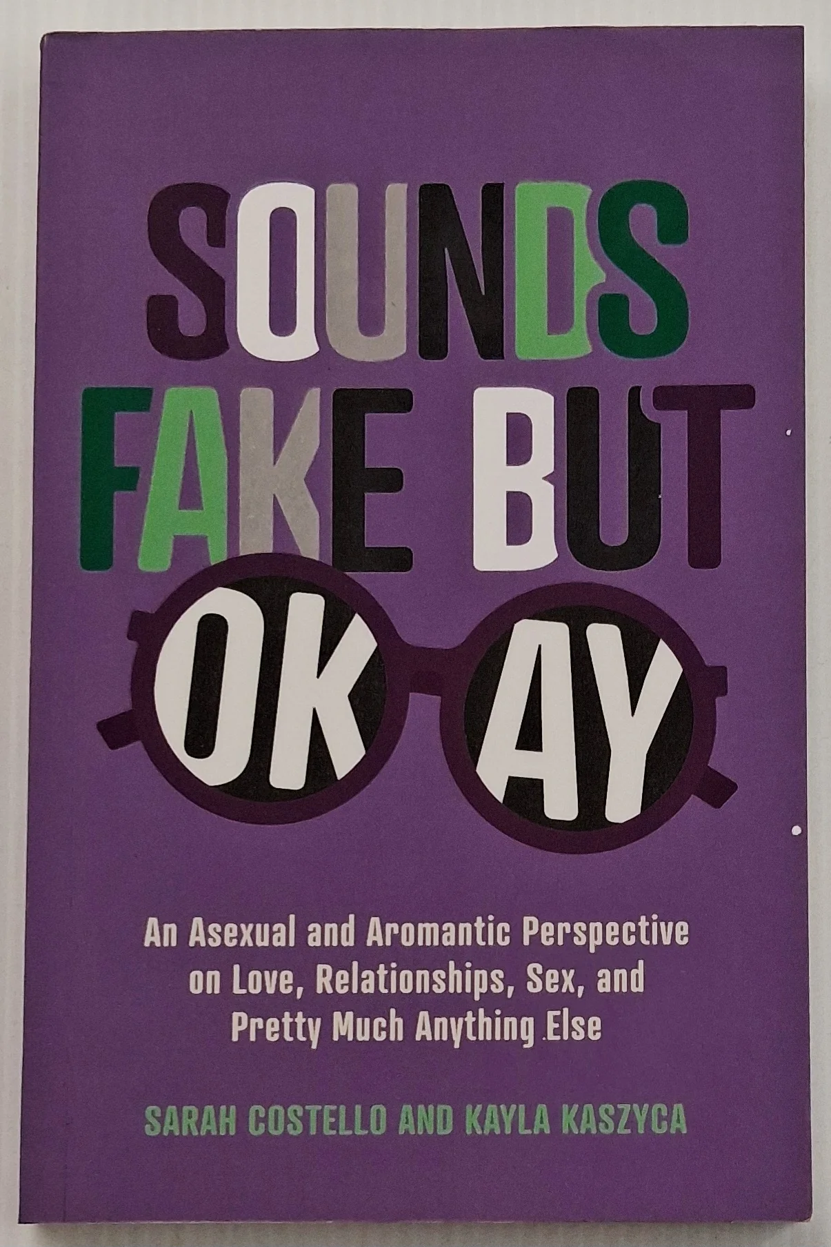 SOUNDS FAKE BUT OKAY - Sarah Costello, Kayla Kaszyca