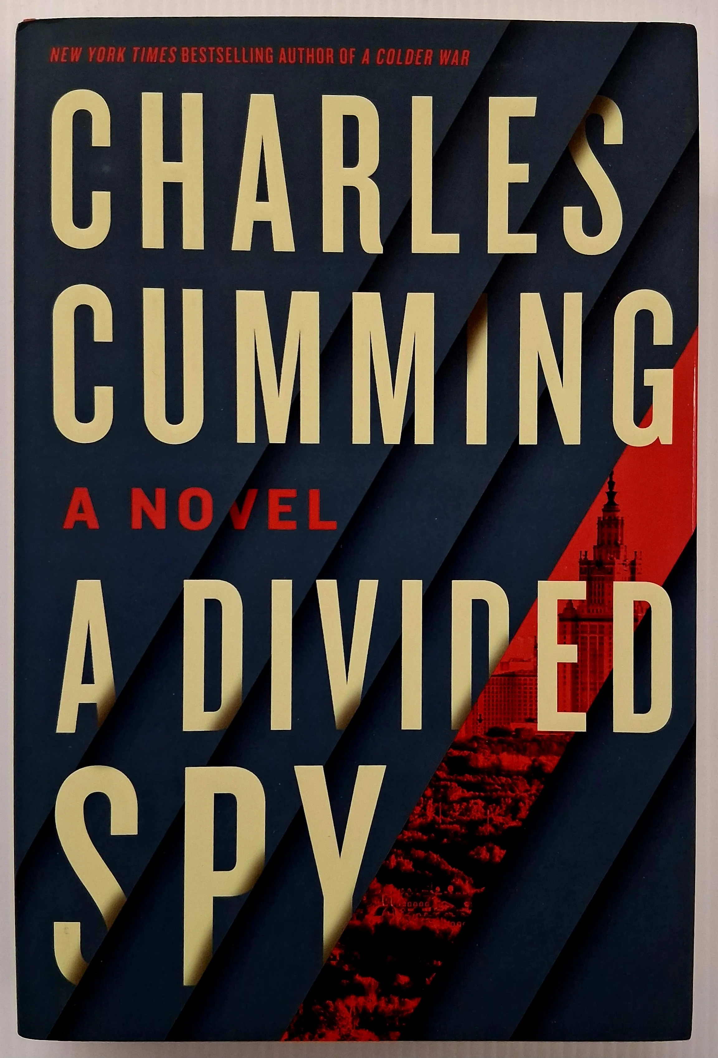 A DIVIDED SPY (SIGNED) - Charles Cumming